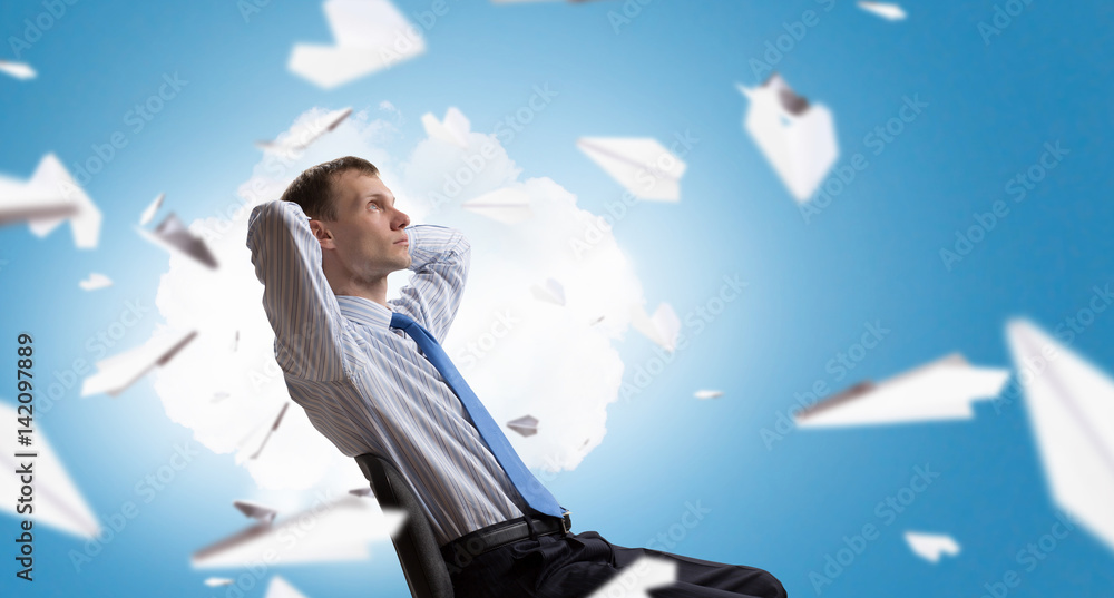 Businessman in chair having rest Businessman in chair having rest