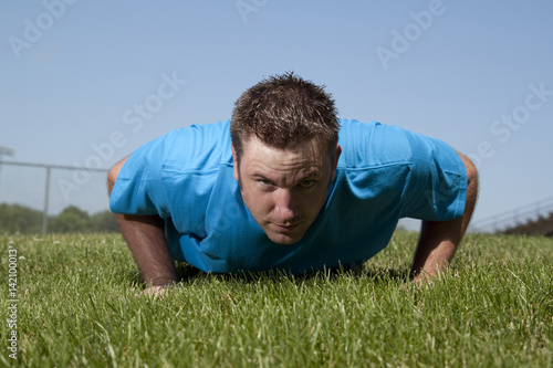 Athletic man posing outdoors
