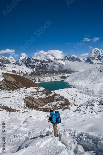 Man is trekking near Gokyo lake in Everest region, Nepal