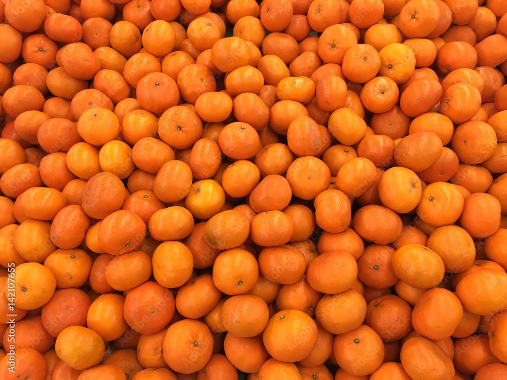 Closeup of oranges on a market

