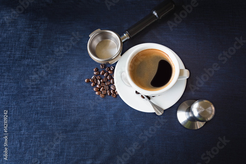 Coffee cup and beans with Equipment for coffee photo