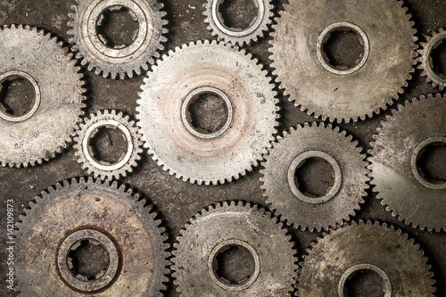 Old rusty gears on the floor