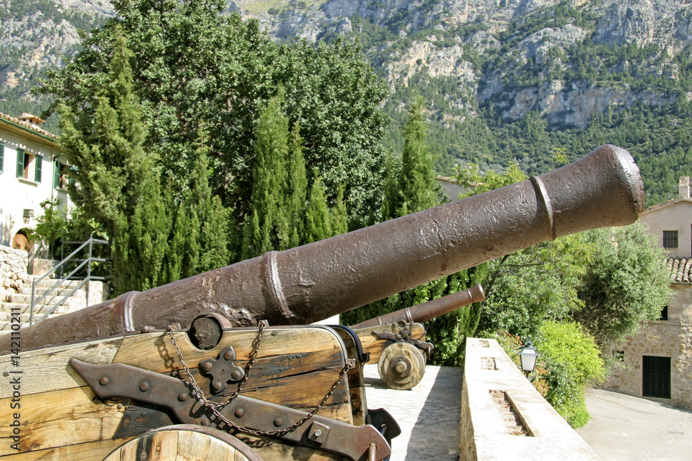 Old Cannon in the Artist village Deià, Mallorca, Balearic Islands, Spain, Europe Old Cannon in the Artist village Deià, Mallorca, Balearic Islands, Spain, Europe