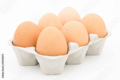 eggs in a box on white background
