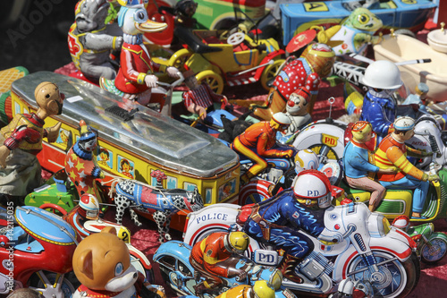 Tin toy traffic jam on the flea market photo