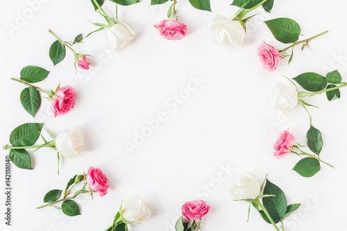 Flowers composition. Frame made of fresh rose flowers. Flat lay, top view