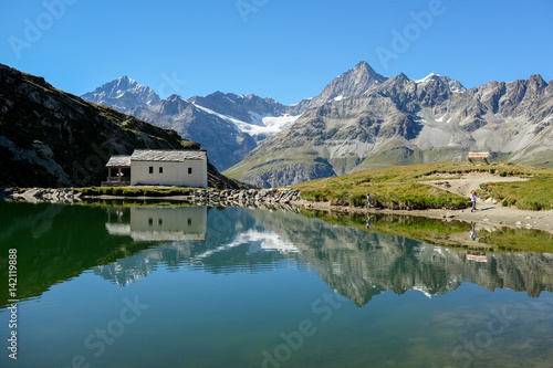 Swiss mountains reflected in lake Schwarzsee near Zermatt.