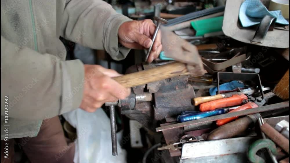 Close up shot of a man work with metal Close up shot of a man work with metal
