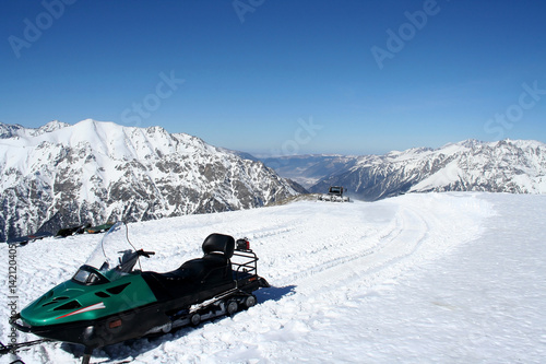 Snowmobile in the mountains of Dombai