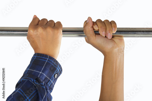 Closeup of male hands in horizontal bar
