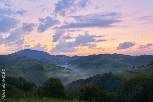 Beautiful from the nature with fog and clouds at sunset © brszattila