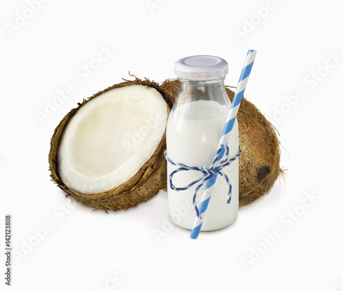 milk of coconut and fresh coconuts isolated on white background. Сoconut with copy space for text.