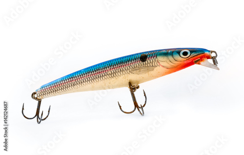 Vintage old fishing lure isolated on white background