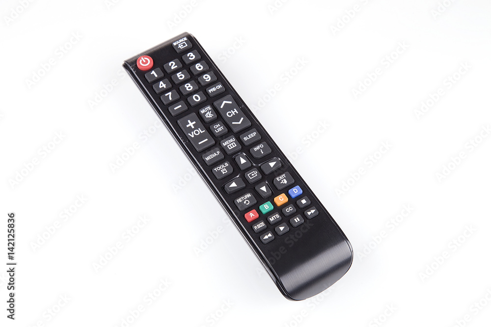 Remote control on a white surface. Isolated on white background. Remote control on a white surface. Isolated on white background.