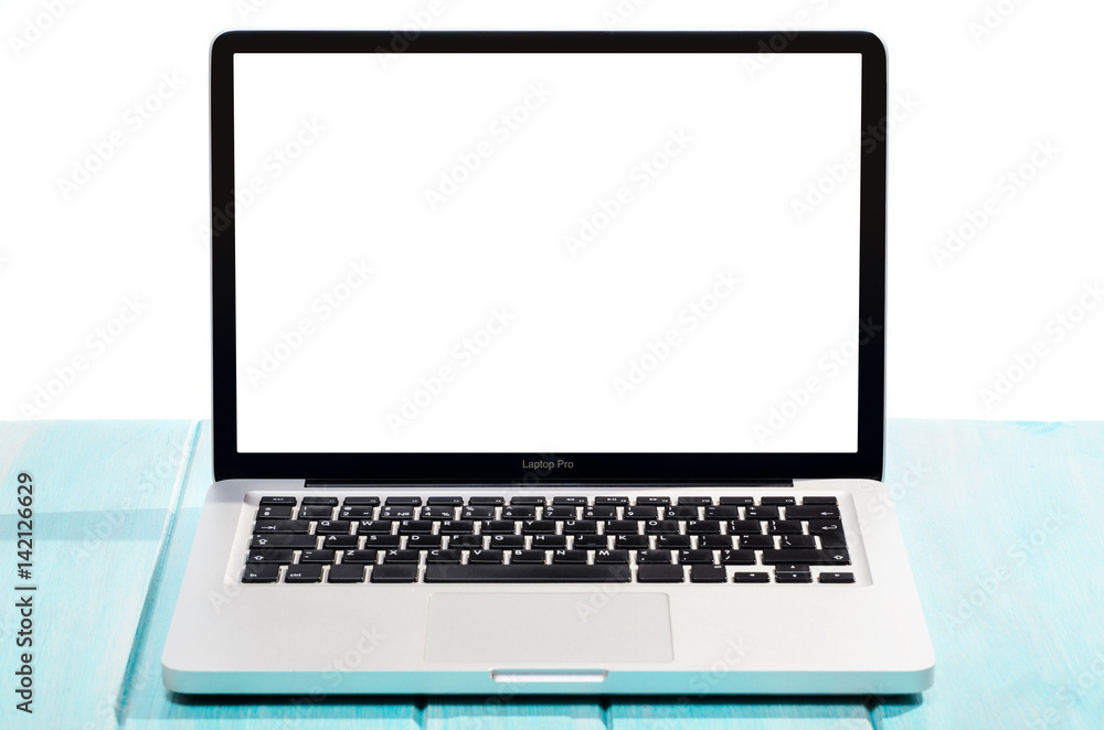 Work on the go. Modern laptop computer on blue wooden table against white background Work on the go. Modern laptop computer on blue wooden table against white background