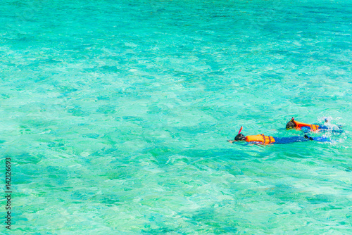 Snorkeling in tropical Maldives island