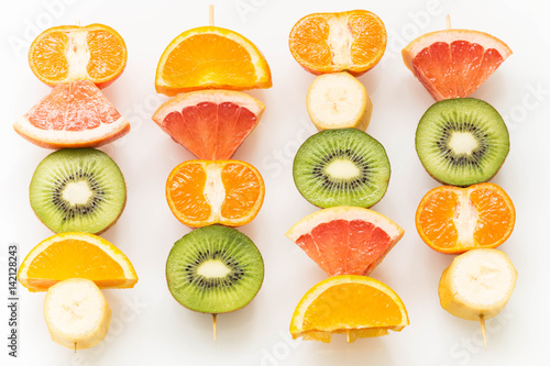 Fototapeta Naklejka Na Ścianę i Meble -  fruit skewers / the concept of healthy eating