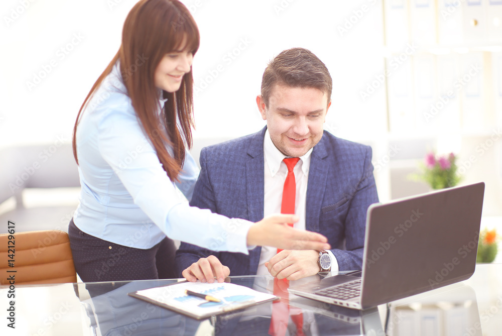 Businesswoman and businessman discuss business concept at work. Businesswoman and businessman discuss business concept at work.