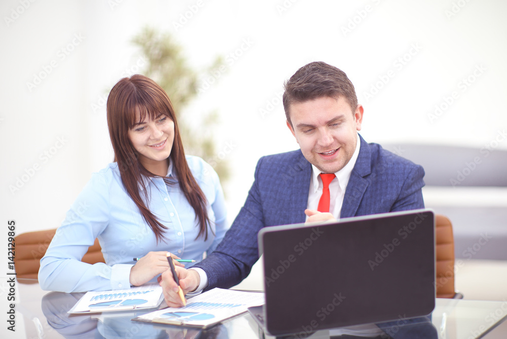 Businesswoman and businessman discuss business concept at work. Businesswoman and businessman discuss business concept at work.