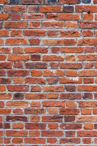 Old aged red brick wall texture background.
