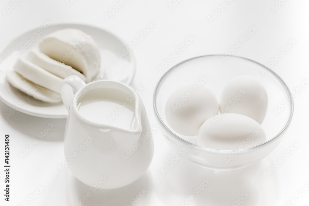 dairy products for proteic meal on white table background dairy products for proteic meal on white table background