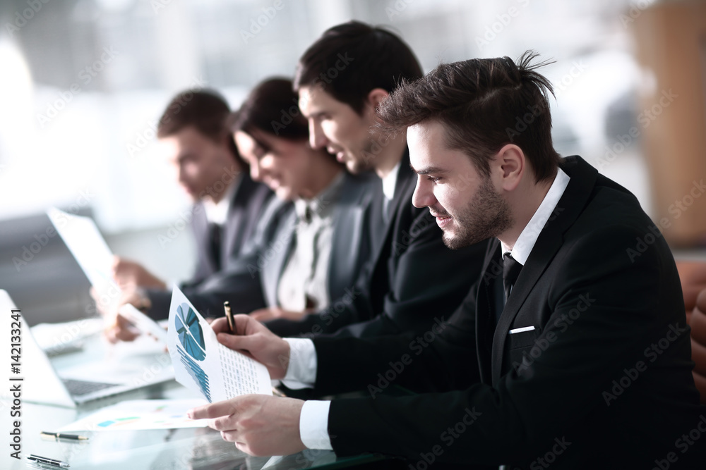 A group of successful businessmen. Discussion of the important contract of the company. A group of successful businessmen. Discussion of the important contract of the company.