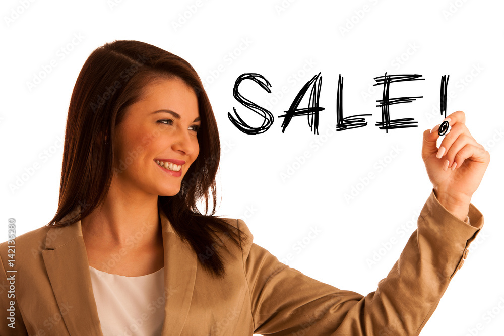 Happy smiling cheerful beautiful young business woman writing or drawing something on screen or transparent glass, by blue marker, isolated over white background Happy smiling cheerful beautiful young business woman writing or drawing something on screen or transparent glass, by blue marker, isolated over white background