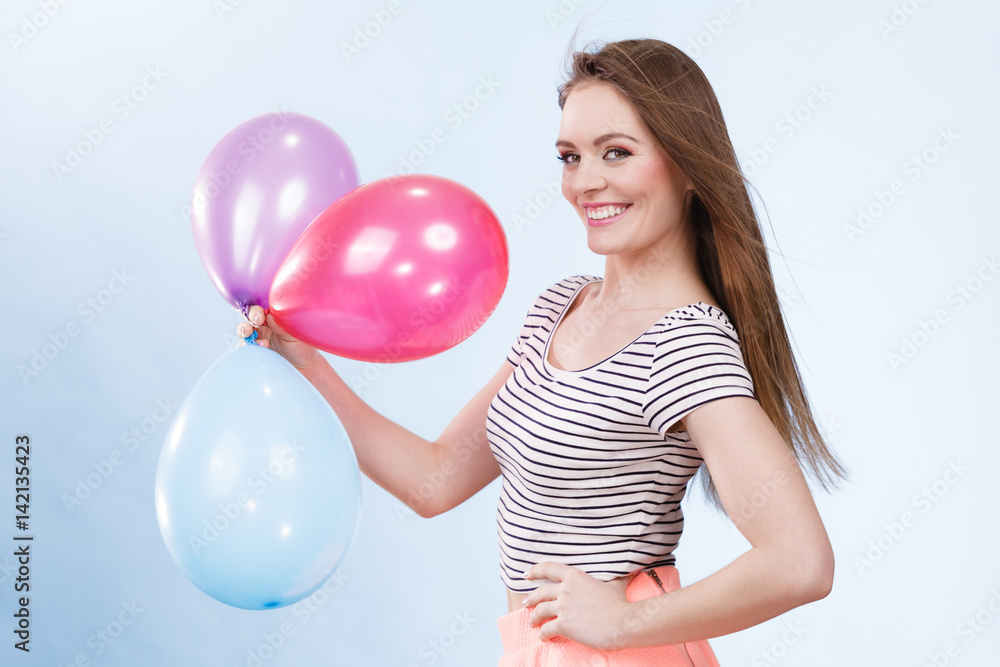 Woman summer joyful girl with colorful balloons Woman summer joyful girl with colorful balloons