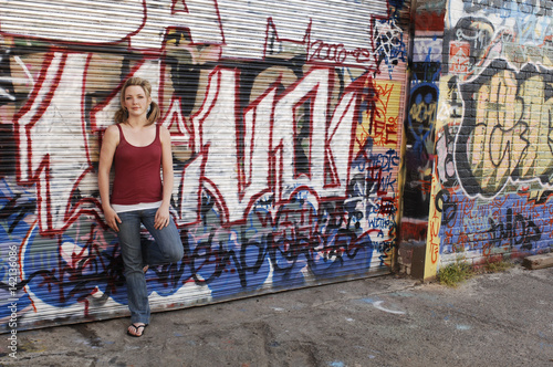 Young Teen Girl in Pigtails with Graffiti