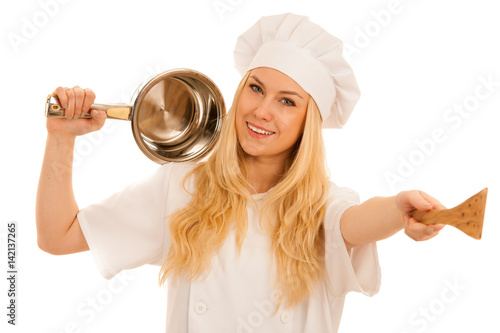 young blonde chef woamn holds kitchenware as she prepares to cook a meal isolated over white background