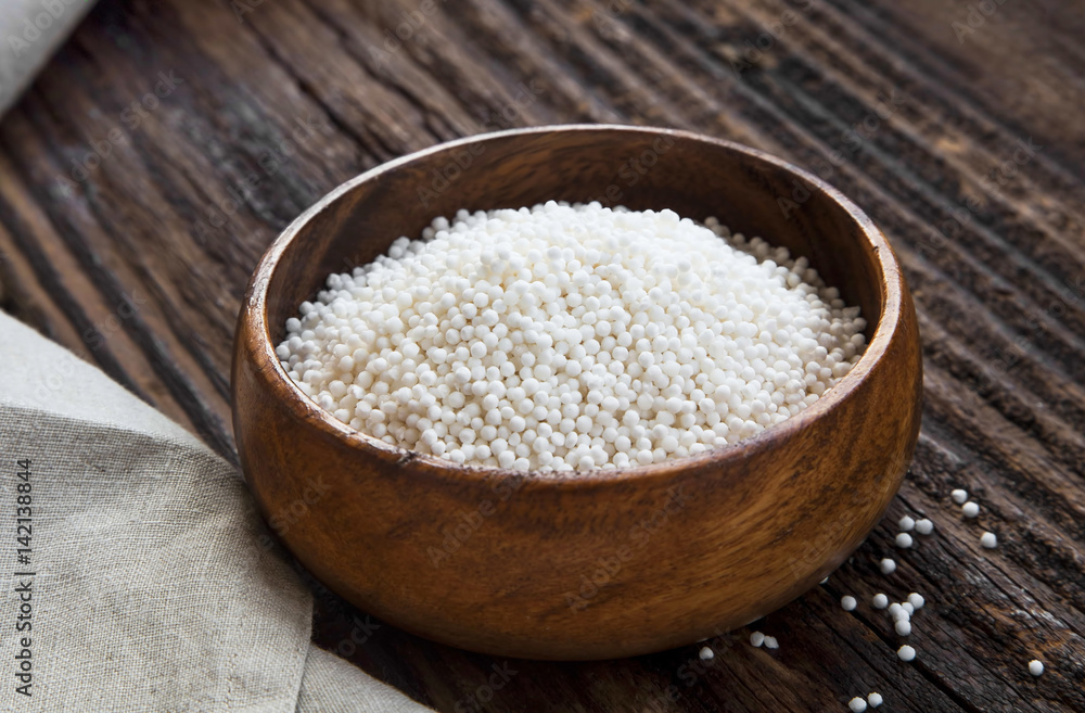 Tapioca pearls in a wooden bowl Tapioca pearls in a wooden bowl