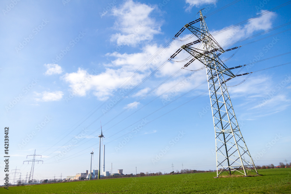 electricity transmission tower on a power house