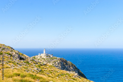 Lighthouse at Cape Formentor in the Coast of North Mallorca near sea and horizont