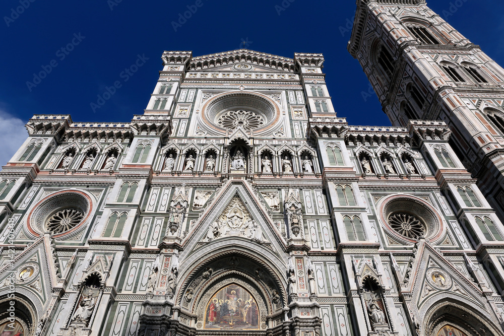Main facade of Duomo Cathedral Santa Maria del Fiore (Basilica of Saint Mary of the Flower, Duomo di Firenze) in Florence, Italy. East facade.