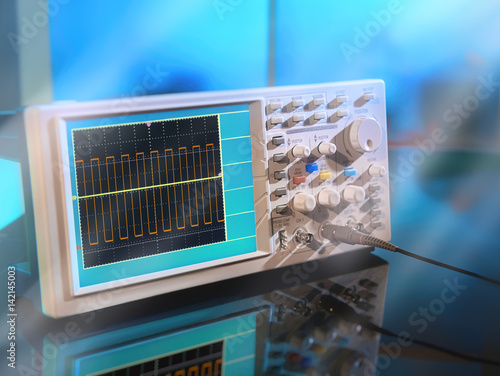 Cuadro en lienzo Modern electronic oscilloscope on abstract background