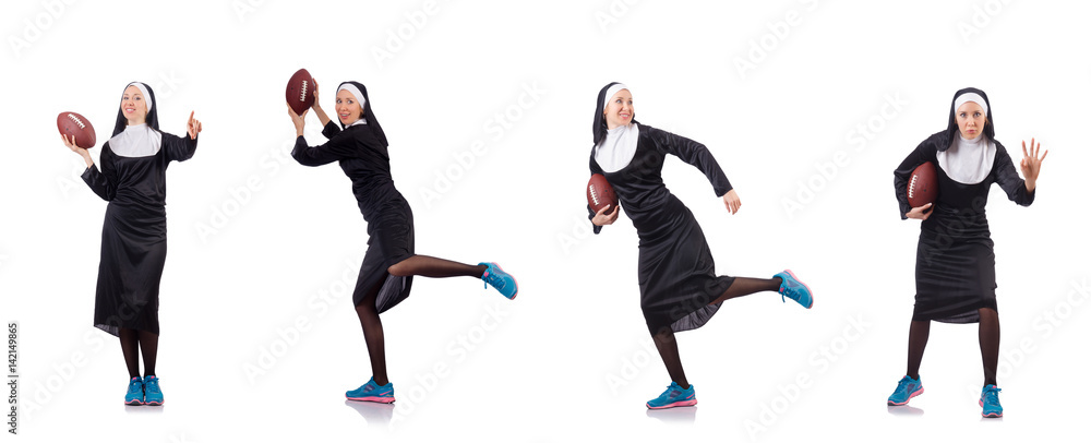 Pretty nun with rugby ball isolated on white Pretty nun with rugby ball isolated on white