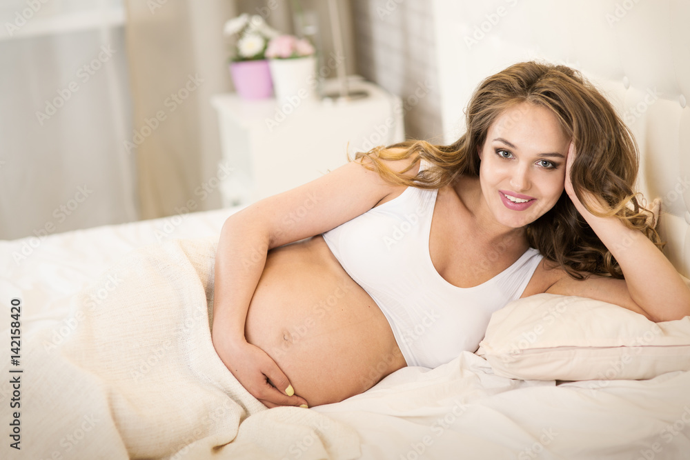 Pregnant woman sitting Pregnant woman sitting