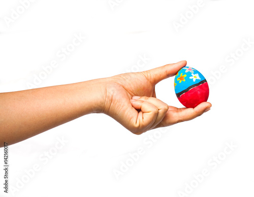 Wallpaper Mural hand holding a easter egg on white Torontodigital.ca