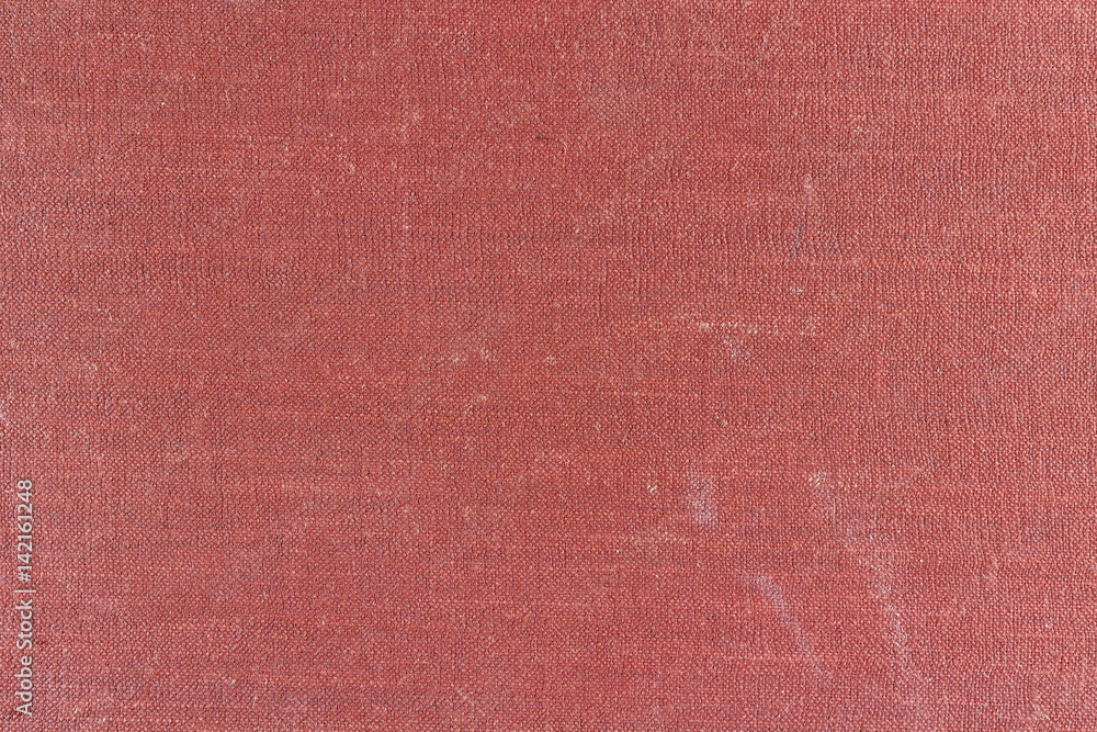 Fototapeta premium Old red textile texture with stains and fading. Abstract background