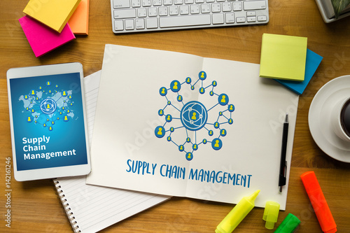 SCM Supply Chain Management concept Modern people doing business, graphs and charts being demonstrated photo