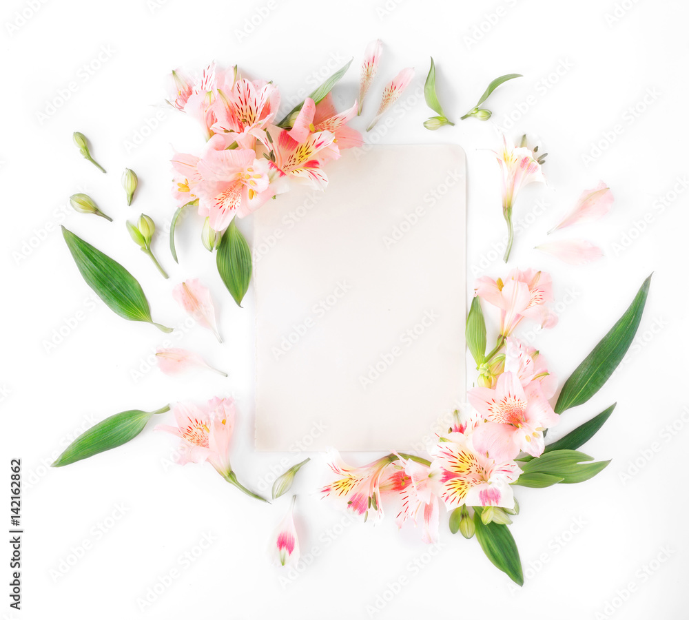 Empty card with alstroemeria, leaves and petals on white background