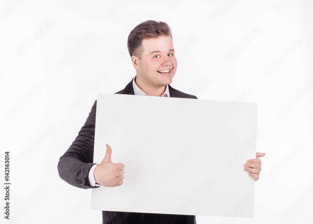 young man holding white blank panel with space for text on white background. young man holding white blank panel with space for text on white background.