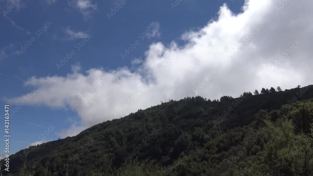 Up Close View of Clouds Moving over Mountain Top Up Close View of Clouds Moving over Mountain Top