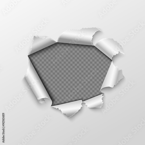 Paper hole with torn edges isolated on transparent checkered background.