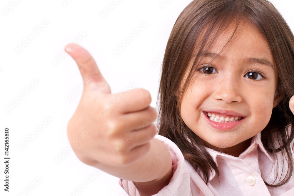 happy, smiling young little girl giving thumb up gesture, isolated happy, smiling young little girl giving thumb up gesture, isolated