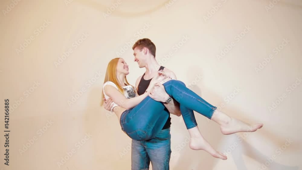 Happy and attractive young couple kissing Happy and attractive young couple kissing