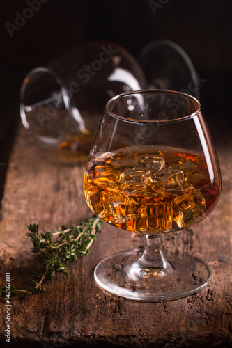 Glass of brandy or cognac  © petrrgoskov