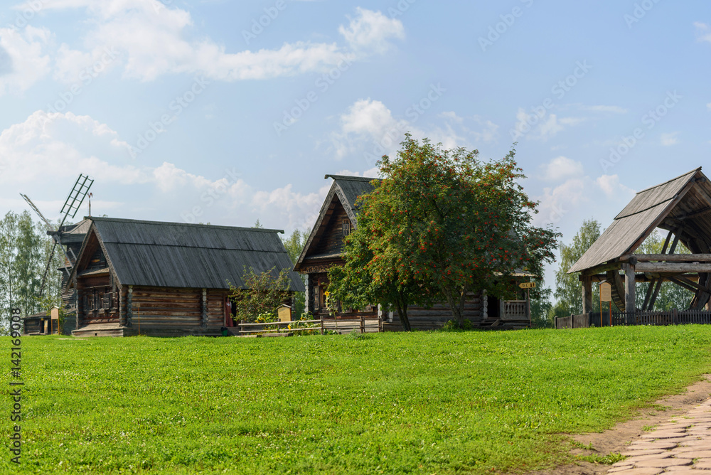 Old wooden rustic house a sunny summer day. Old wooden rustic house a sunny summer day.
