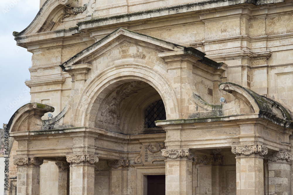 Fragment of The Church of St Catherine of Italy in Valletta, Malta. Renaissance Architecture with decorated arch and columns.