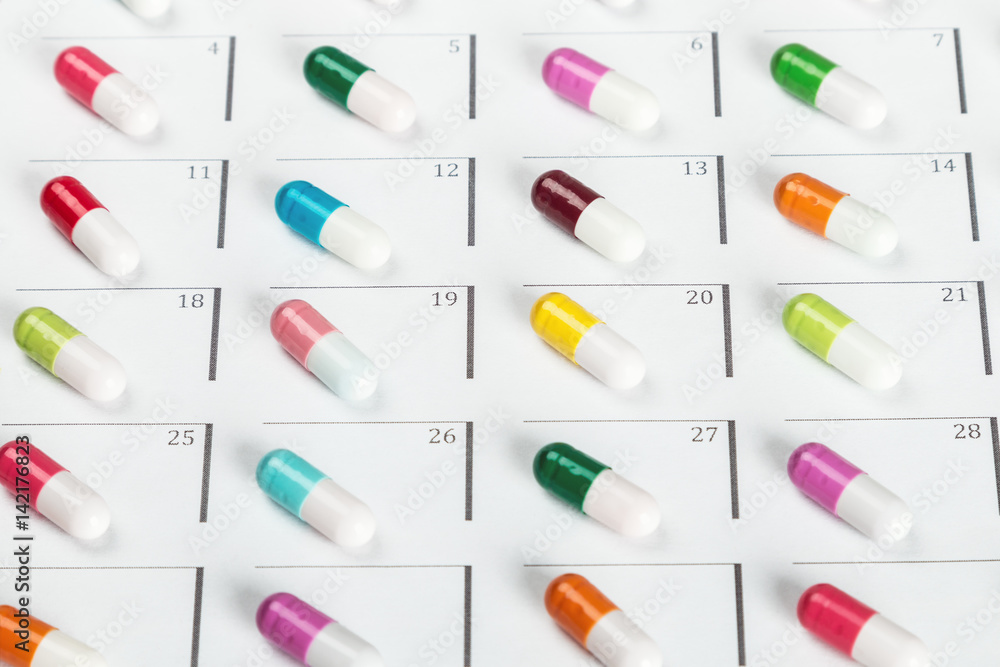 Different colors of the pill on the schedule of taking medicines Different colors of the pill on the schedule of taking medicines